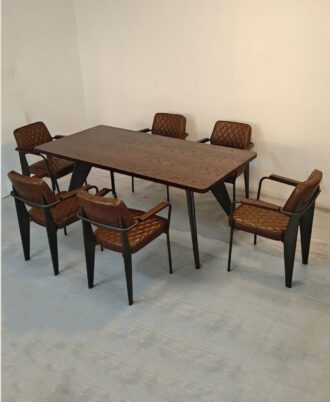 Baron 7-Piece Dining Set showcasing the mahogany-stained oak table paired with six diamond-quilted brown PU leather Bethany chairs.