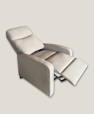 Stanford manual push-back recliner armchair in an upright position upholstered in soft cream fabric
